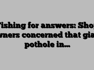 Fishing for answers: Shop owners concerned that giant pothole in…