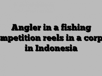 Angler in a fishing competition reels in a corpse in Indonesia